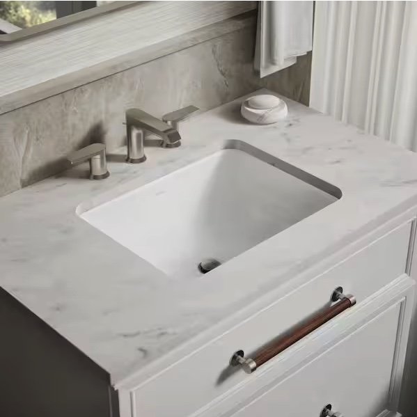 White quartz countertop with subtle veining with undermount sink